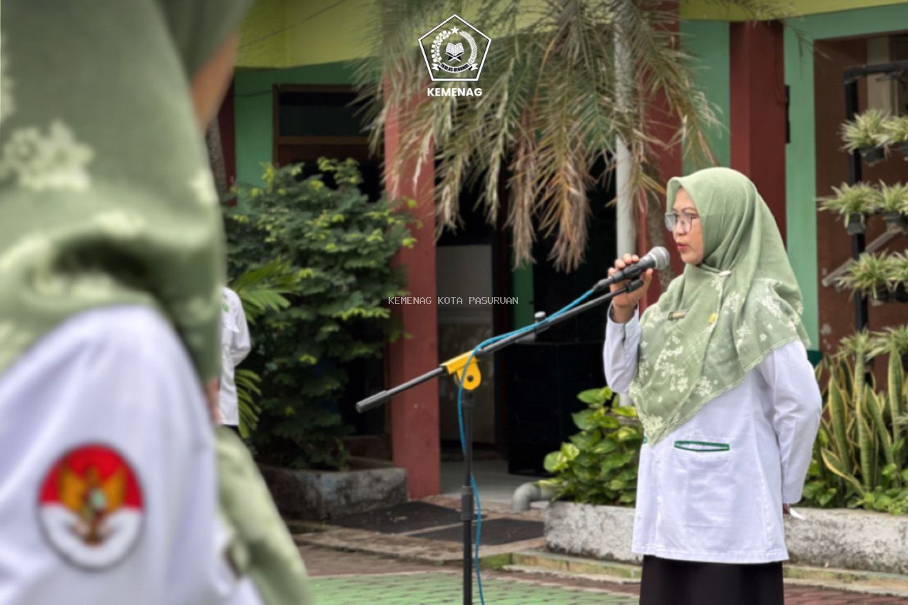 Ditengah Rintik Hujan, Apel Pagi Kemenag Kota Pasuruan Teguhkan Komitmen Integritas 
